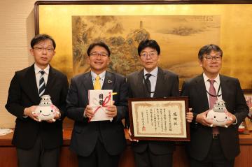 三菱電機モビリティ株式会社の感謝状贈呈式の写真